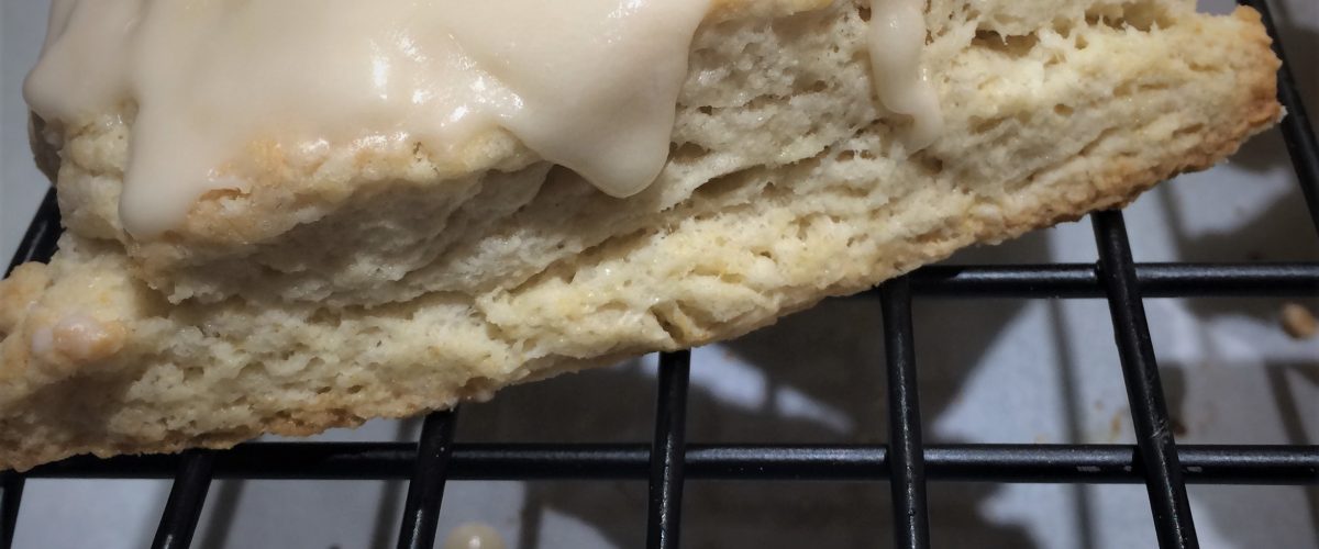 Vanilla scone on a baking rack by Crystal Smith.