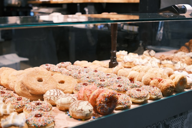 Display case of donuts.