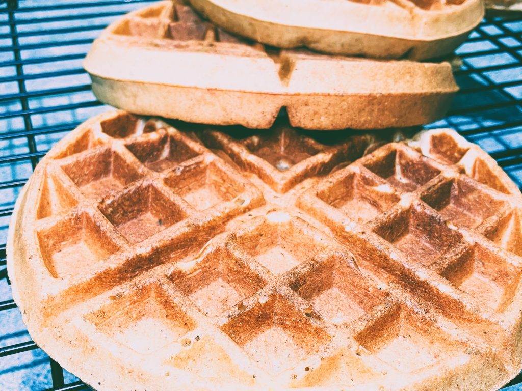 Stack of wholegrain waffles by Crystal Smith.